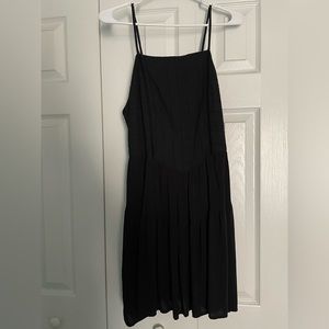 Black flow dress.Pattern on the top part.Perfect for a spring or summer occasion